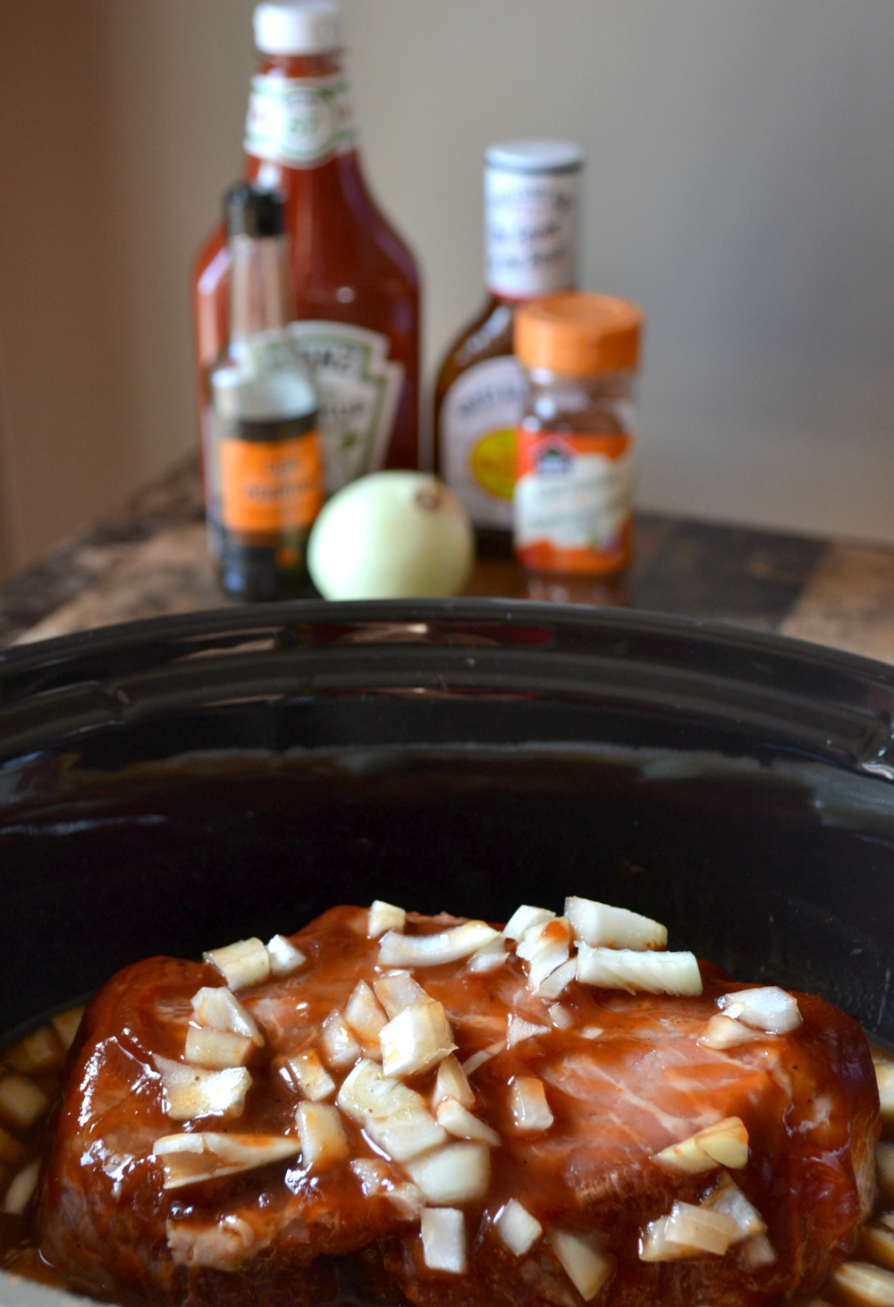 Slow cooker BBQ beef - so easy to make using items you already have on hand. Serve with kaiser buns, coleslaw, horseradish and other favorite BBQ Beef on a Bun toppings!